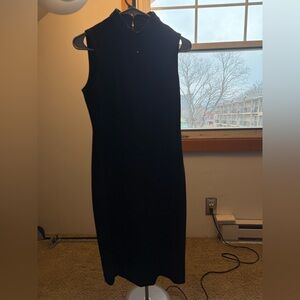 Black sleeveless dress with faux leather collar